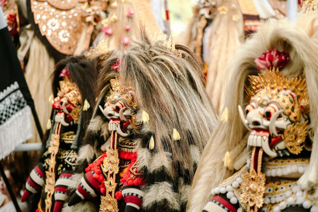 Close-up of traditional balinese barong masks with elaborate headdresses