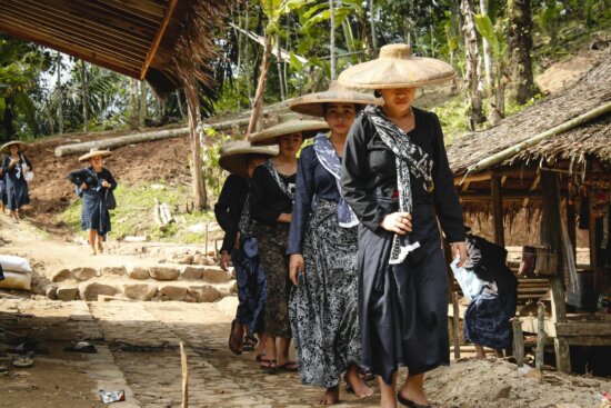 a group of women wearing hats